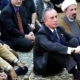 Mayor Bloomberg on prayer rug with this buddies