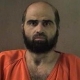 Nidel Hasan has received more than $300,000 in pay from the Army since he shot down 13 soldiers at Ft. Hood