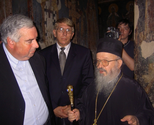 Father Keith Roderick and William Murray visit Orthodox priest in a burned out church in Kosovo