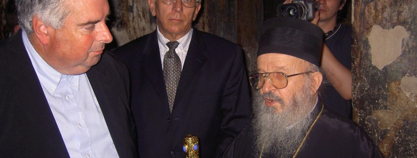 Father Keith Roderick and William Murray visit Orthodox priest in a burned out church in Kosovo