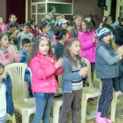 At this Christmas event north of Beirut one of the youngest girls began to cry when it was time to leave. At one point all chairs were stacked for the children to be able to play various organized games.