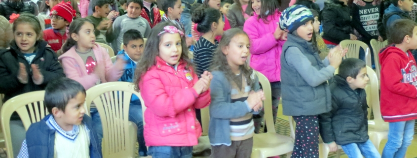 At this Christmas event north of Beirut one of the youngest girls began to cry when it was time to leave. At one point all chairs were stacked for the children to be able to play various organized games.