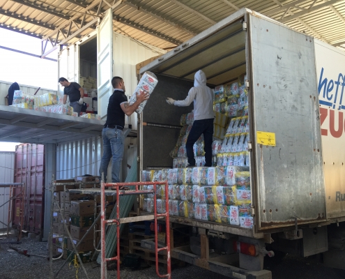First truck of diapers being unloaded on March 8th at our partner warehouse in Iraq.
