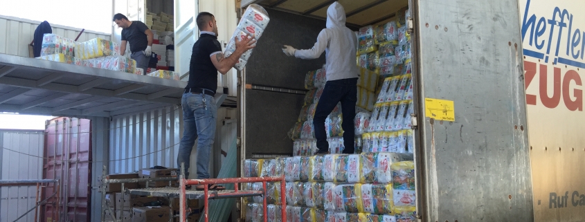 First truck of diapers being unloaded on March 8th at our partner warehouse in Iraq.