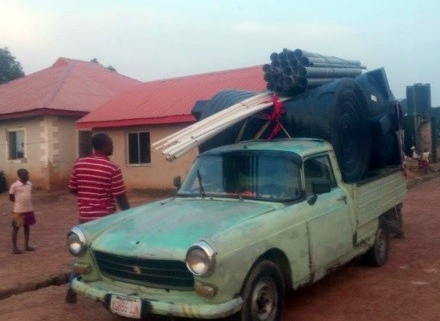 A small truck arrives with parts for new water system being supplied by the Religious Freedom Coalition.